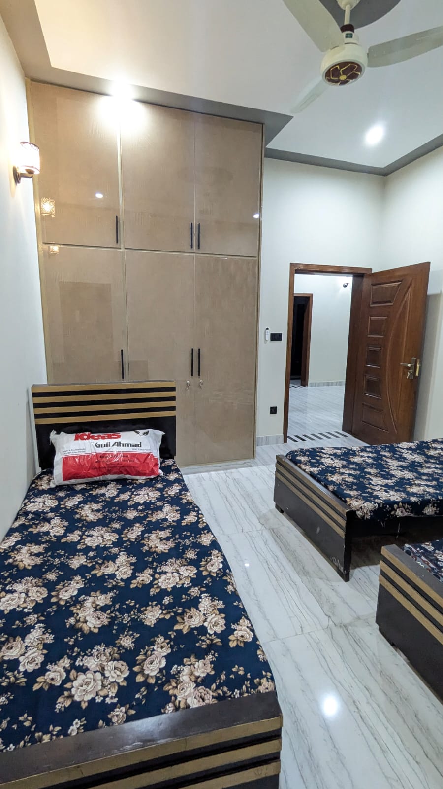 Girls hostel near Shaukat Khanum Lahore — room with built-in wardrobe