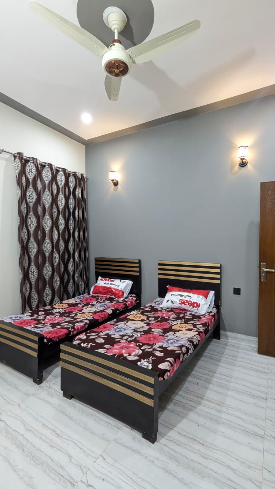 Hostels in Lahore for girls — furnished room with storage